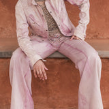 Handmade luxury leather and bead halter by LilaBare with pink jacket and trousers