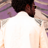 Back view close up of model in structured blazer with gold beadwork by LilaBare