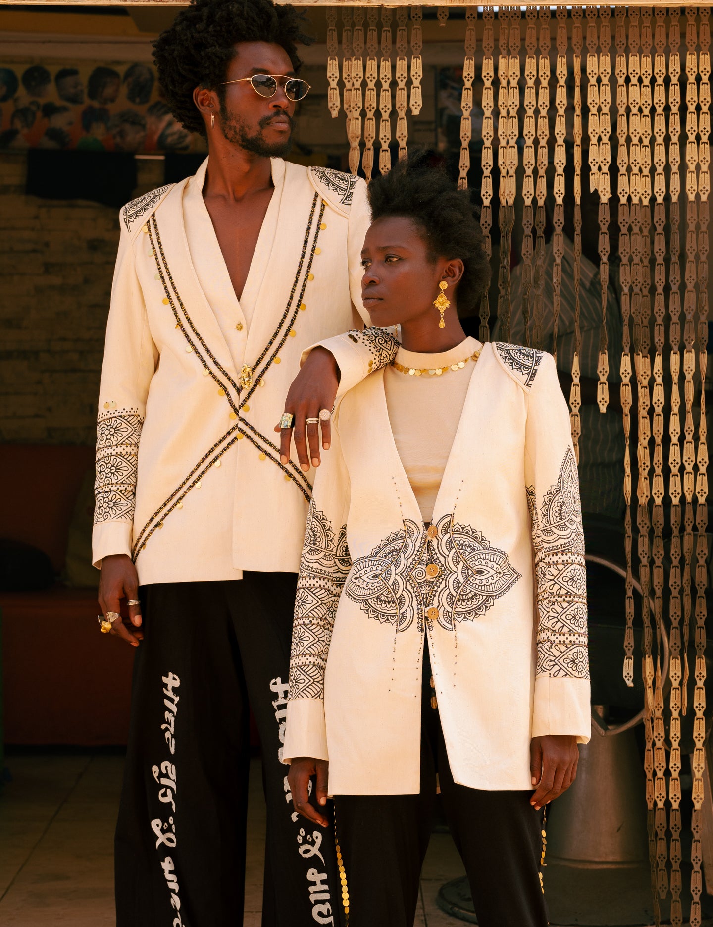 Editorial shot of Mehendi Blazer styled open with jewelry
