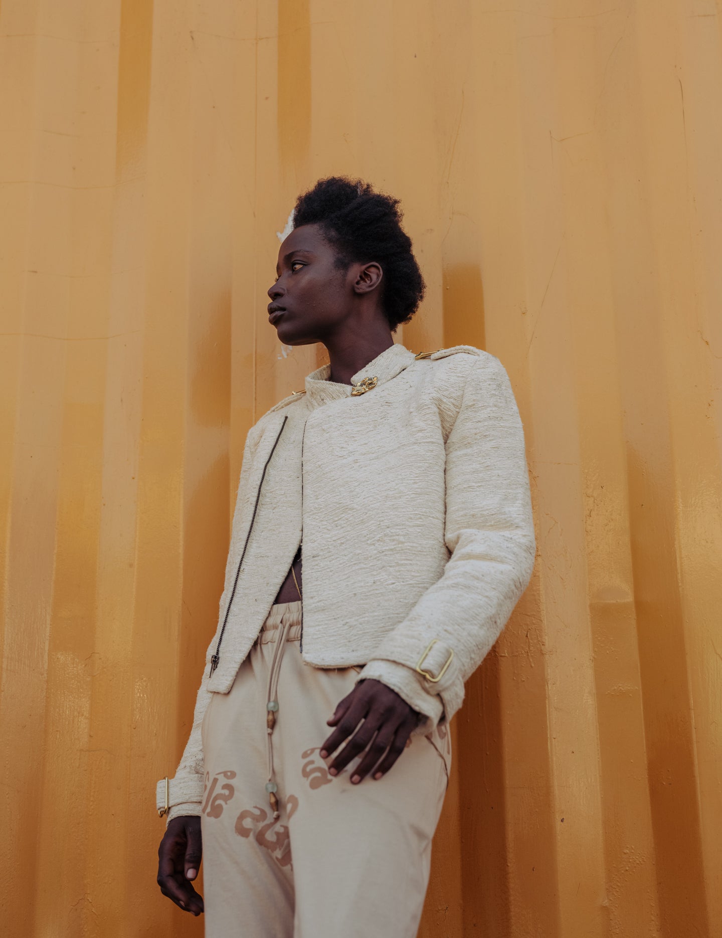 Full view of LilaBare’s moto jacket made from pineapple fiber with brass fastenings and sculpted silhouette