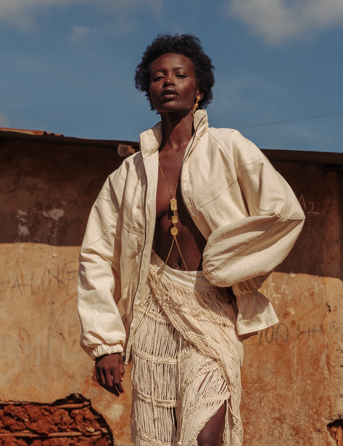 Gender-neutral fashion jacket in Kenyan woven cotton