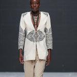 Runway close up shot of Mehendi Blazer styled open with jewelry