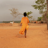 Back view of flowing Storm Kimono against natural landscape