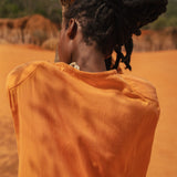 Back view of flowing Storm Kimono against natural landscape